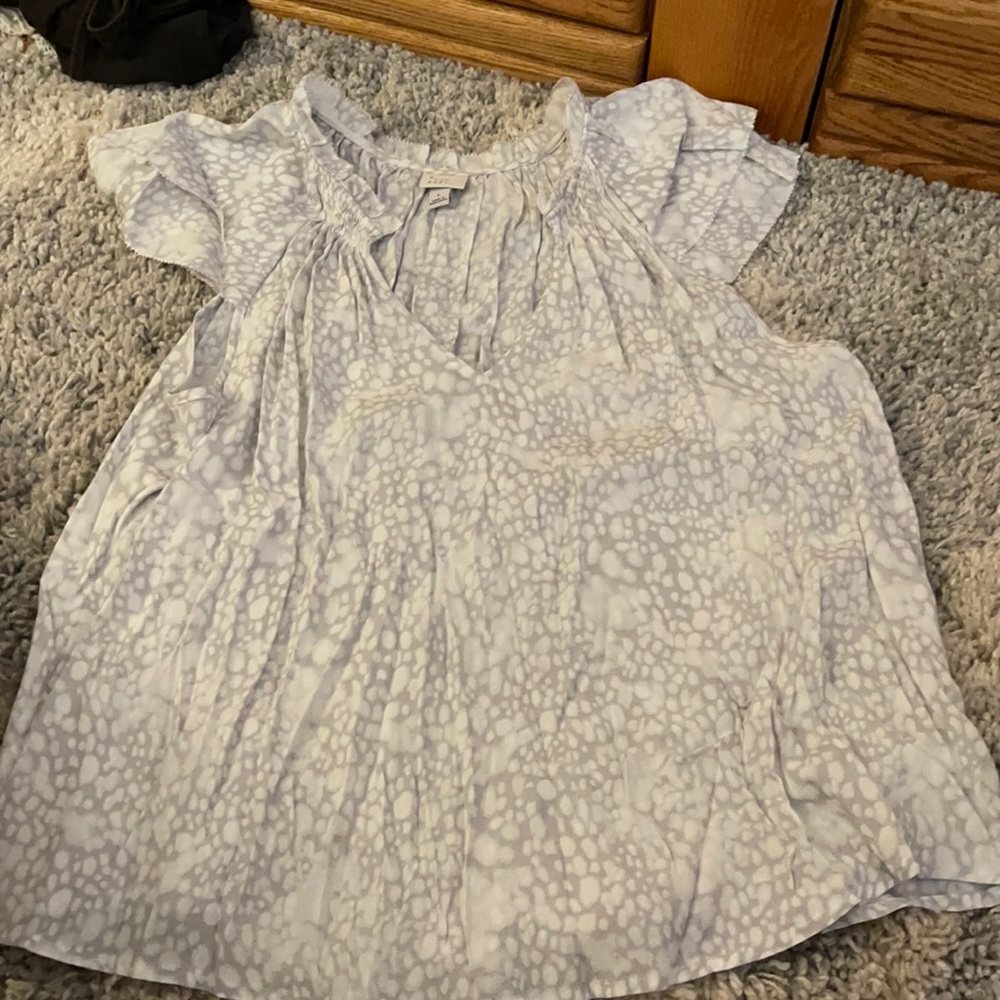 White and grey spotted blouse